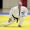 Judo federation strips titles from Putin and Russian oligarch