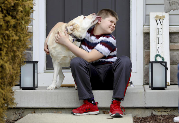 Photo of Nolan Balcitis with his dog 
