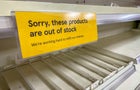 Empty Supermarket Shelves Apology Sign. Covid19 Coronavirus Pandemic affecting supply lines and deliveries due to lockdowns and closed borders. UK Pingdemic causes many essential food and retail staff to self isolate. 