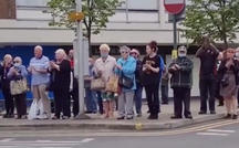 Customers say goodbye to beloved cafe owner 