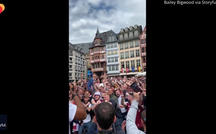 Sports fans photobomb wedding photo 