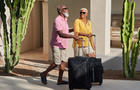 Couple traveling with luggage 