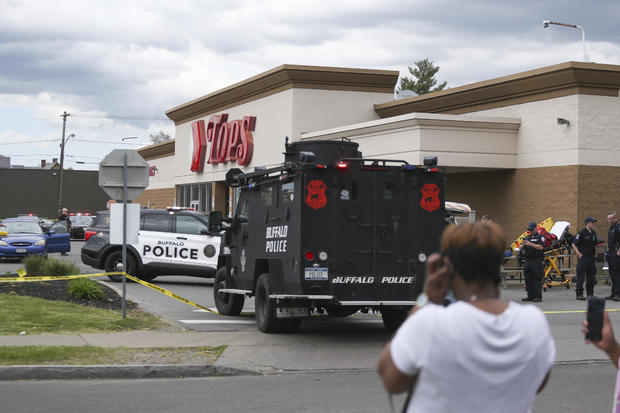 Police vehicles astatine  Buffalo supermarket shooting country   