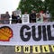 Chanting climate change activists disrupt Shell shareholders meeting